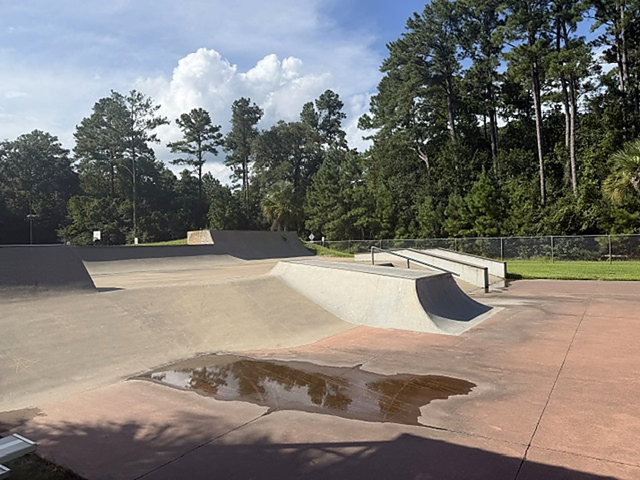 The concrete skate park at North Glynn Recreation Complex in Brunswick, Georgia, showing bowls, ramps and rails.